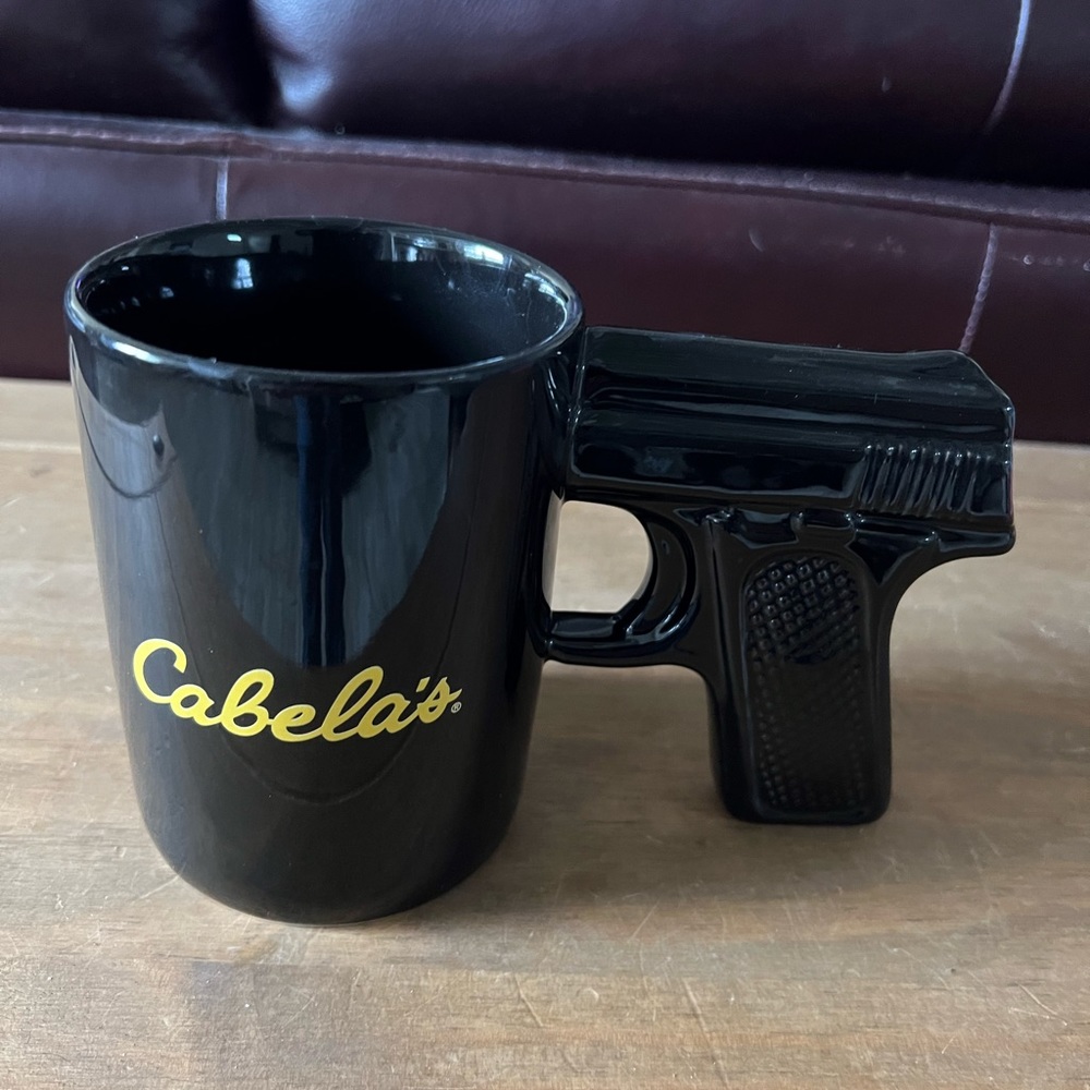 Cabela’s pistol grip coffee mug.excellent condition